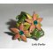 Bruine klei bloem ring met Swarovski kristal en groene bladeren