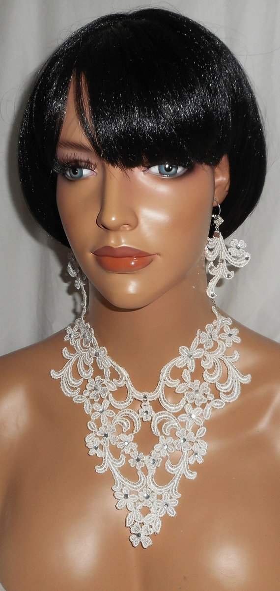 Oorbellen met Swarovski kristal en arabesk kant