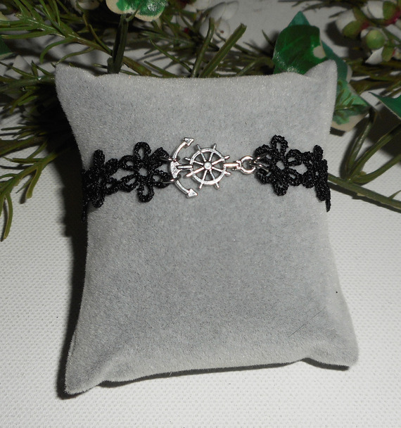 Originele armband met anker en roer op zwarte kant