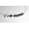 Originele armband in zee-inkt en kleine hematietparels aan een 925 zilveren ketting