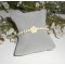 Parels en roos armband in ruwe gorgon op zilveren sluiting
