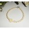 Parels en roos armband in ruwe gorgon op zilveren sluiting