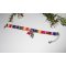Kleurrijke stoffen armband met dolfijn en rode zeesterren kwastjes