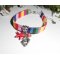 Kleurrijke stoffen armband met dolfijn en rode zeesterren kwastjes