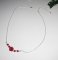 Roze halsketting met rode gorgon aan 925 zilveren ketting