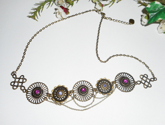 Bronzen tiara met roze en paarse Swarovski kristallen strass