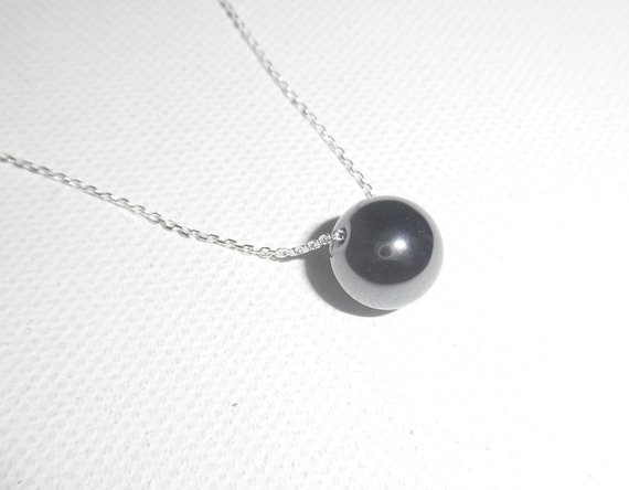 Hematietsteen hanger aan 925 zilveren ketting