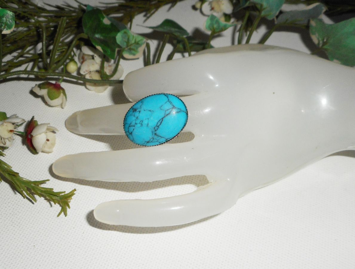 Cabochon ring met ovale turkooizen steen