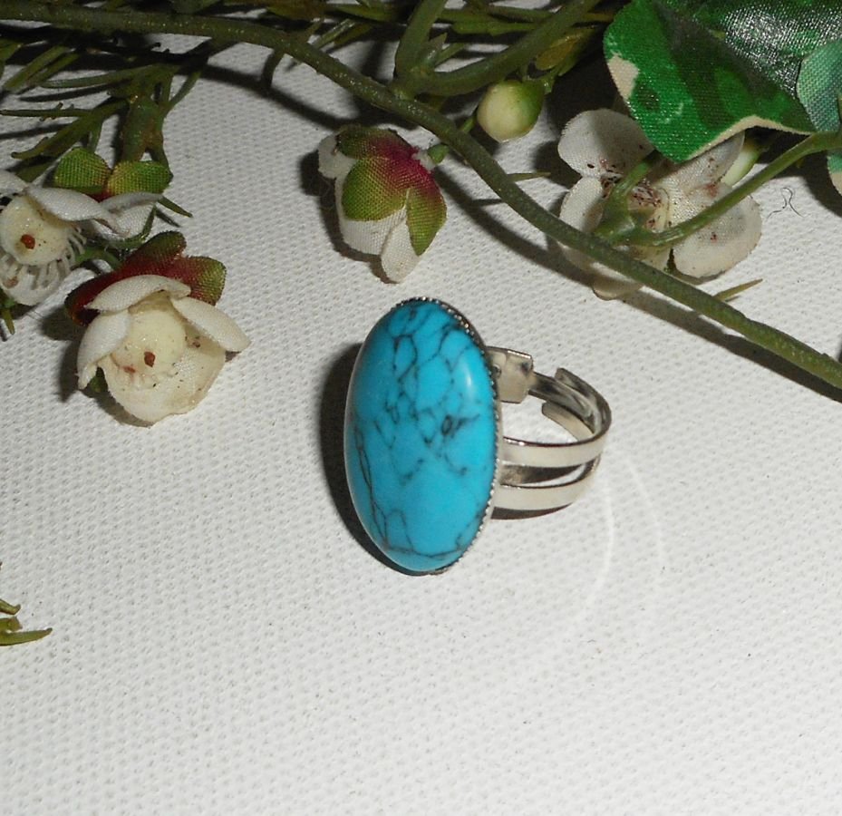 Cabochon ring met ovale turkooizen steen