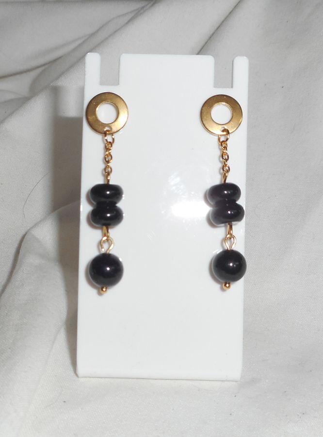 Onyx stenen oorbellen aan roestvrij staal gouden ketting