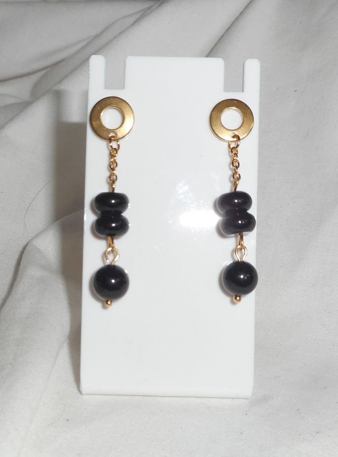 Onyx stenen oorbellen aan roestvrij staal gouden ketting