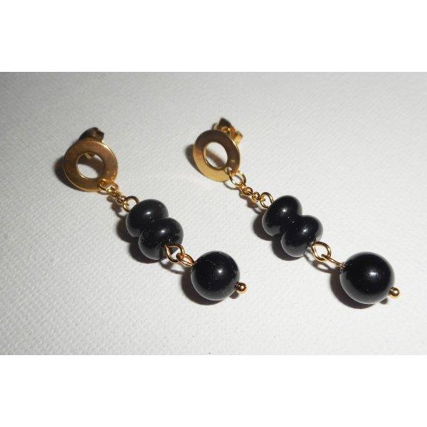 Onyx stenen oorbellen aan roestvrij staal gouden ketting