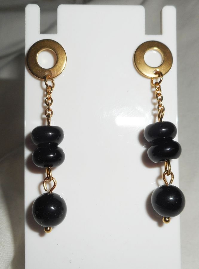 Onyx stenen oorbellen aan roestvrij staal gouden ketting