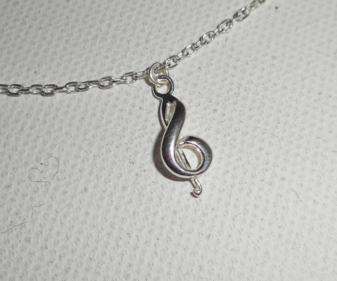 Armband/enkelketting met muzieknoot aan 925 zilveren ketting