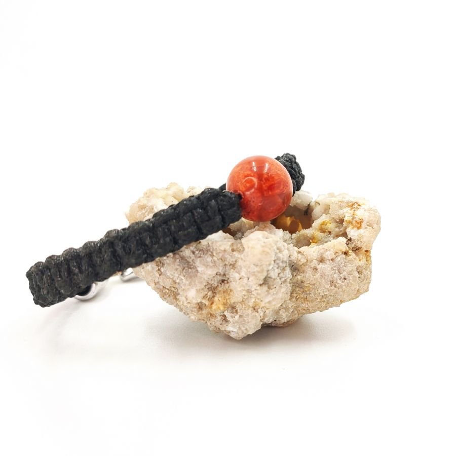 Geweven touw armband met oranje gorgon kraal