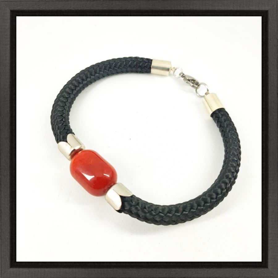 Geweven touw armband met barrel carnelian steen