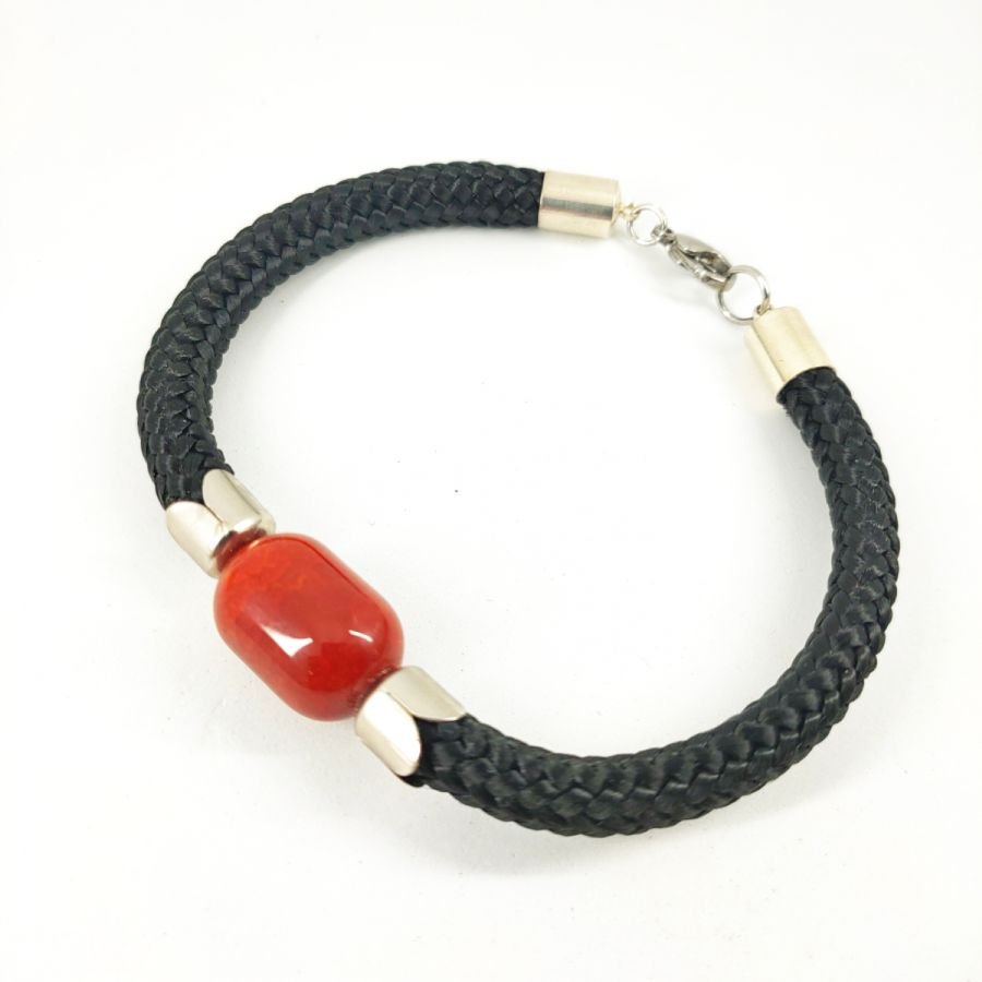 Geweven touw armband met barrel carnelian steen