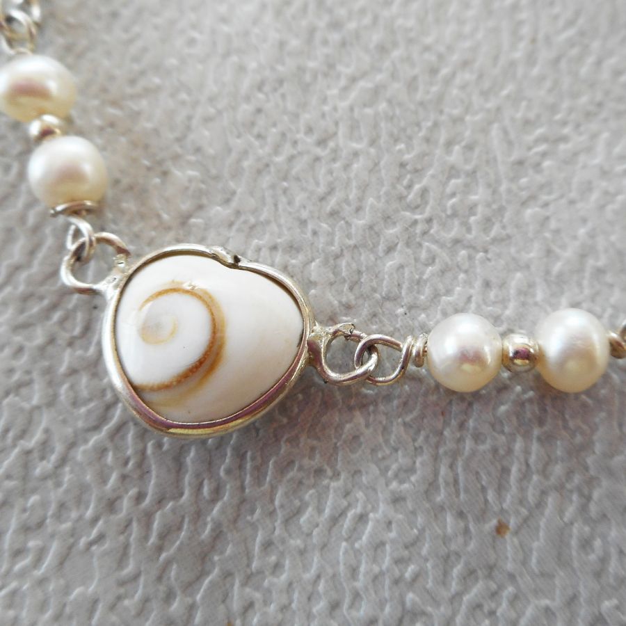 Gekweekte parel armband met St Lucia oog hart in zilver 925