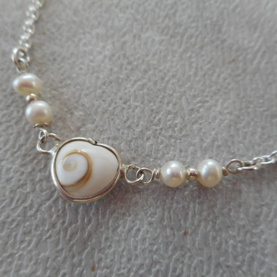 Gekweekte parel armband met St Lucia oog hart in zilver 925