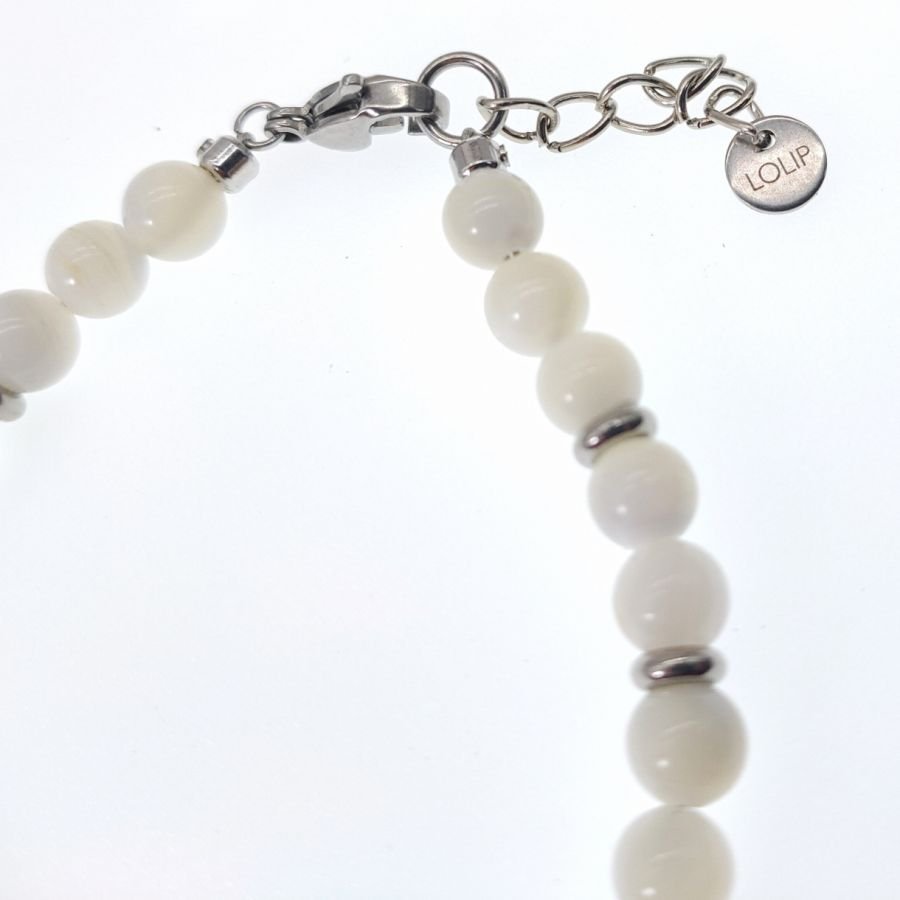 Witte parelmoer en roestvrij stalen armband