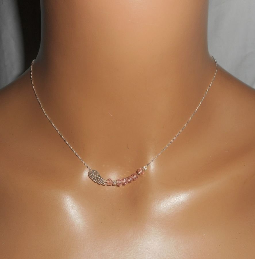 925 zilveren choker ketting met kleine vleugel en roze kristallen kralen