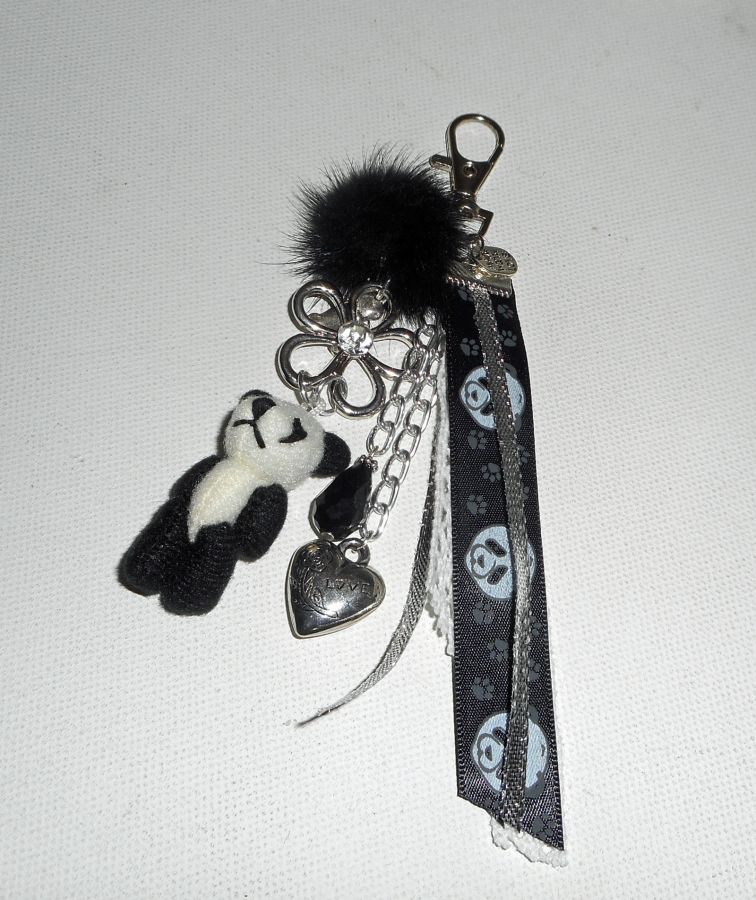Sleutelhanger/Panda tas sieraden met zwarte nerts pompon en linten