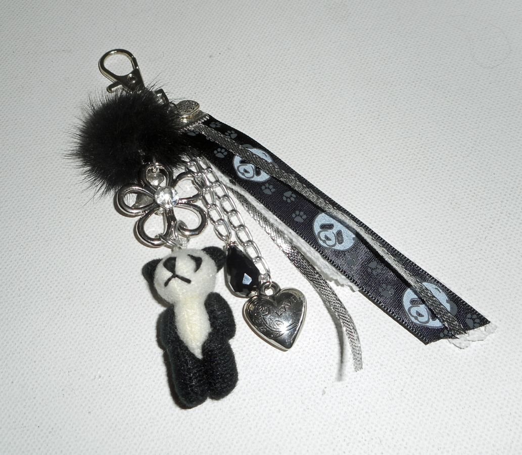 Sleutelhanger/Panda tas sieraden met zwarte nerts pompon en linten