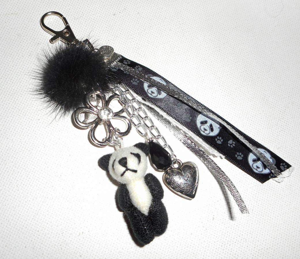Sleutelhanger/Panda tas sieraden met zwarte nerts pompon en linten