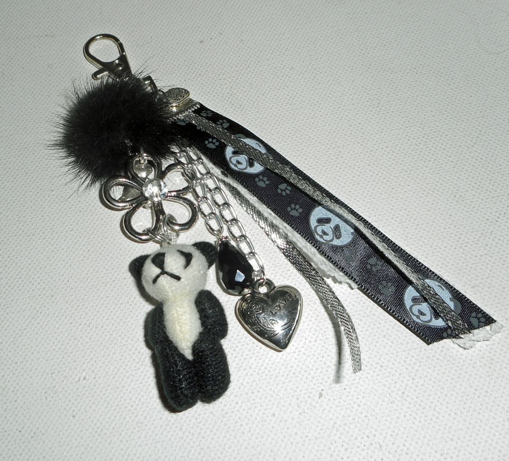 Sleutelhanger/Panda tas sieraden met zwarte nerts pompon en linten