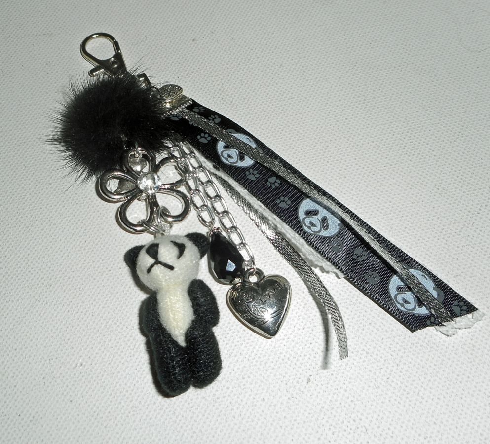 Sleutelhanger/Panda tas sieraden met zwarte nerts pompon en linten
