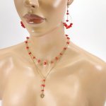  Dubbele rij ketting bezet met rode gorgon en zon