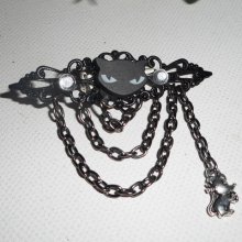 Zwarte hars kat broche met kristallen strass steentjes en zwarte ketting
