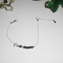Originele armband in zee-inkt en kleine hematietparels aan een 925 zilveren ketting