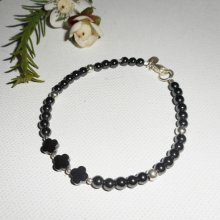 Originele armband bloemen en steentjes in hematiet met zilveren buisjes 925