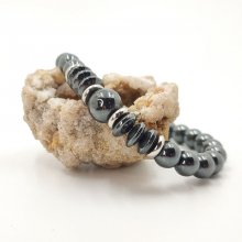 Antraciet grijze heren armband van hematietsteen en roestvrij staal.